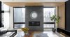 Modern home with Living Room, Ceiling Lighting, Gas Burning Fireplace, Light Hardwood Floor, Ribbon Fireplace, and Sectional. living room Photo 7 of Résidence à Stoneham