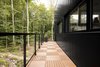 Side porch. Photo 10 of Résidence à Stoneham modern home