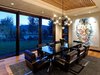 Modern home with Dining Room, Medium Hardwood Floor, Chair, and Table. Dining room brings the outdoors in Photo 2 of Aspen Vision House