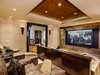 Modern home with Living Room, Carpet Floor, and Recessed Lighting. Cozy two-tier theatre room Photo 7 of Aspen Vision House