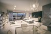 Modern home with Living Room, Console Tables, Ceiling Lighting, Sofa, Bookcase, and Concrete Floor. Verve by Libeskind, Zabel Property (part of the JLL group) Photo 3 of Verve by Libeskind