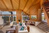 Modern home with Living Room, Sofa, Chair, Coffee Tables, Console Tables, Bookcase, Wall Lighting, Track Lighting, Slate Floor, and Standard Layout Fireplace. An Expansive Use of Wood and Glass Photo 3 of J. Lamont Langworthy Design