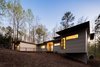 Modern home with Exterior, House, Green Roof Material, Concrete Siding Material, Flat RoofLine, and Metal Siding Material. The house was designed to glow like a lantern at twilight. Photo 3 of Professor's House