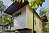 Modern home with Exterior, House, Green Roof Material, Concrete Siding Material, Flat RoofLine, and Metal Siding Material. The different overhangs provide an abstract composition. Photo 10 of Professor's House