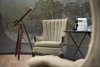 Modern home with Living Room and Chair. Perks include Nespresso coffee machines, complimentary breakfast and treats, and fluffy robes and slippers. The larger, premium domes include a soaking tub and other thoughtful furnishings. Photo 4 of Enchanting Bubble Domes in the Irish Woods