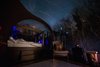 Modern home with Bedroom, Bed, and Chair. Sky views are best enjoyed January to March when visibility of the Milky Way is at its best. Photo 10 of Enchanting Bubble Domes in the Irish Woods
