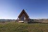Modern home with Exterior, Metal Roof Material, Wood Siding Material, Cabin Building Type, and A-Frame RoofLine. David Ferguson of Kimo Estate took construction into his own hands in a two-person owner-builder team. Photo 5 of Kimo Estate