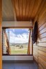 Modern home with Bath Room, Wall Lighting, Ceramic Tile Floor, and Open Shower. Even the bathroom comes with an expansive view. Photo 12 of Kimo Estate