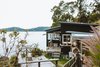Modern home with Exterior, Wood Siding Material, House Building Type, and Metal Roof Material. The couple’s eco-friendly renovation process took 18 months. Photo of The Little Black Shack