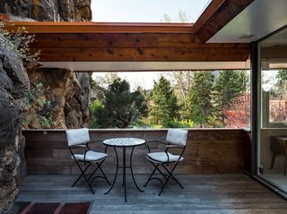 The deck has been recently rebuilt with silver mahogany and is situated for views of Red Rocks and the Flatirons.