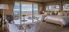 Modern home with Bedroom, Bed, Floor Lighting, Chair, Lamps, Medium Hardwood Floor, Table Lighting, and Night Stands. The newly added 581-square-foot Dulili, which translates to "together" in the local Aboriginal dialect, accommodates up to seven people. Photo 4 of Sierra Escape