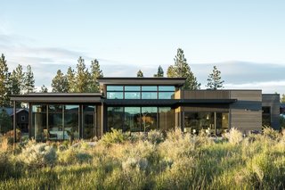 The timber-clad home's natural palette takes cues from the desert landscape.