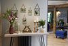 The view from the entry foyer toward the living room. The console table is from Guin. Photo 8 of Ravendere Retreats modern home
