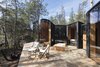 Modern home with Outdoor, Large Patio, Porch, Deck, Woodland, Front Yard, Shrubs, Wood Patio, Porch, Deck, Trees, Grass, and Hot Tub Pools, Tubs, Shower. The netted, hammock-like balustrades are an innovative solution that provides safety and a place for relaxation, while keeping views as unobstructed as possible. Photo 11 of Freycinet Lodge