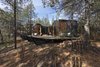 Modern home with Exterior, Wood Siding Material, Prefab Building Type, Metal Roof Material, Cabin Building Type, Glass Siding Material, and Flat RoofLine. Some pavilions overlook the water, while others are nestled further into the coastal bushland. Photo 10 of Freycinet Lodge