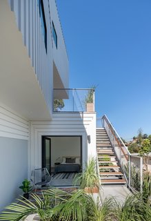 Accessed via a separate entry, the second-level ADU can be used as an office, fourth bedroom, or a suite for a possible tenant.