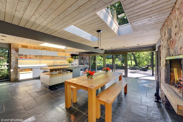 Best 60 Modern Dining Room Design Photos And Ideas Dwell Natural Black Clefted Slate Flooring Continues From The Entrance Foyer To Open Kitchen And Dining