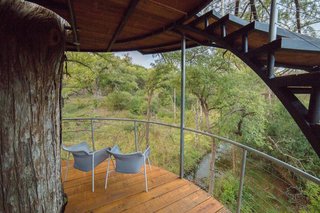A pair of creekside deck chairs can be found on the Yoki's outdoor terrace.