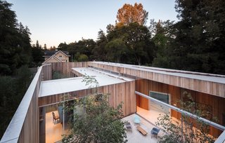 The roofline of the breezeway is raised to allow for clerestory glazing.