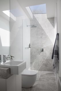 The light-filled ensuite bathroom includes a Nickles showerhead and MIZU taps.