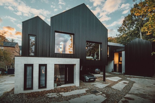 At 2,120 square feet, Jon's home (on the left) is slightly smaller than his brother's 2,540-square-foot house (on the right). Though the homes feature different floor plans, each has five bedrooms and three bathrooms.