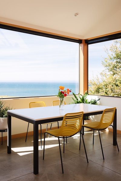 The eat-in kitchen features a dining space that overlooks spectacular views of the Pacific Ocean.