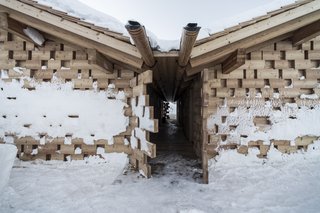 The shingled wood roofs were inspired by South Tyrollean architecture.