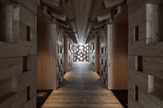 The four rooms in each chalet are not connected, but they can be accessed via a shared hallway to ensure privacy.