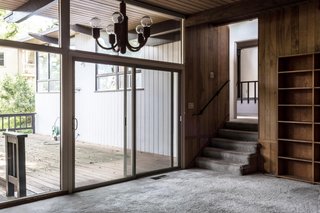 Wrapped in wood paneling and lined with old carpet, the dining area felt dark and stuffy before the renovation.