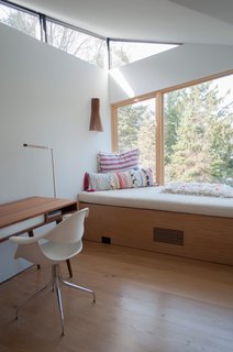 Catherine's favorite space in the house is this second-floor study by the master suite. "It's a great lounge area with a view of the lake," she says. "Everybody wants to go up there and read a book."