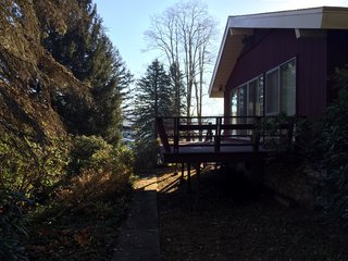 Before: Previously, the north side of the home housed a single bedroom, bath, and outdoor deck with lake access.