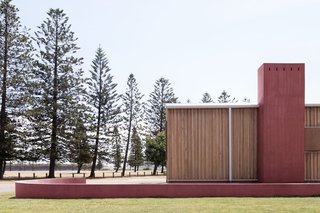 To comply with flood control laws, the home is elevated on a solid brick platform, a design inspired by Jørn Utzon’s text, "Platforms and Plateaus."