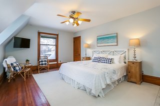 The large master bedroom comes with a luxurious master bath, three closets, and two large windows.