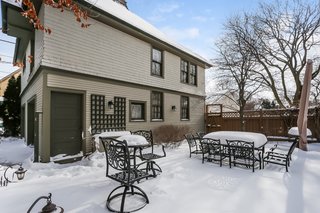 The remodel turned the two-story coach house into a garage with space for two large SUVs and plenty of storage.