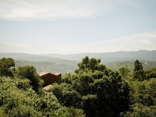 Set on a forested hillside, the home feels completely secluded. The closest neighboring house is 500 feet away and out of sight.