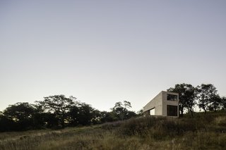 The Aculco holiday home is “completely isolated in the middle of nowhere surrounded by nature,” the architects say.