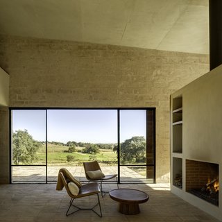 West Elm chairs are paired with a locally crafted wooden table.