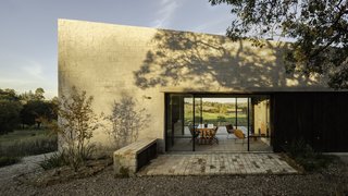 Walls of glass allow for uninterrupted views through the building. 