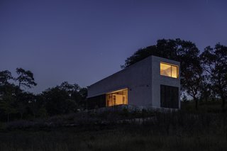 The holiday house at night.