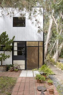 The south elevation of the studio. Note the variety of materials used; Ray and Charles used a mix of panels made from plaster, plywood, asbestos, glass, and fiberglass-like "pylon."