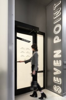 Ten-foot-tall signage greets customers at the entrance.