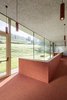 Modern home with Hallway and Carpet Floor. Colorful FINDEISEN needled carpets cover the floors, walls, doors—and even the lighting. Photo 5 of Family Resort Rainer