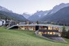 Modern home with Exterior, Flat RoofLine, Wood Siding Material, Shed RoofLine, Green Roof Material, House Building Type, Metal Siding Material, and Glass Siding Material. On the green roof, guests enjoy stunning panoramic views, a hydromassage pool, and a lounge area. Photo of Family Resort Rainer