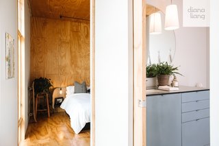 Sliding pocket doors, such as this one for the guest bathroom, are installed throughout the house to save space.