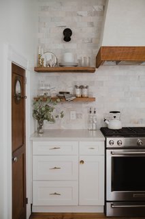 "We splurged on Anthropologie hardware for the cabinets, and don’t regret that ever," adds Claude.