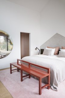 A peek into the master bedroom that connects to a walk-in closet.