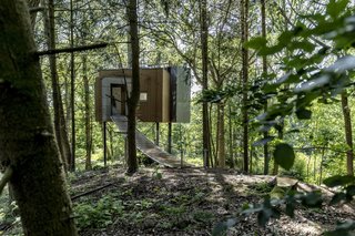 The first Løvtag cabin (of nine planned) is located in a forest at Als Odde. "The cabins are located on a small hilltop overlooking a meadow which gives a wonderful view over the top of the forest and lets the sunshine in during the afternoon," says architect Sigurd Larsen.