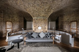 A central brick column anchors the space.