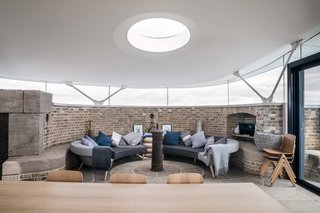 The home comprises nearly a million bricks, which have been left exposed to reference the building's architectural history.