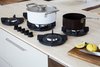 Modern home with Kitchen, Cooktops, and White Cabinet. A close-up view of the PITT Cooking stovetop. The pots are by kindustrie. Photo 12 of Federal Bungalow